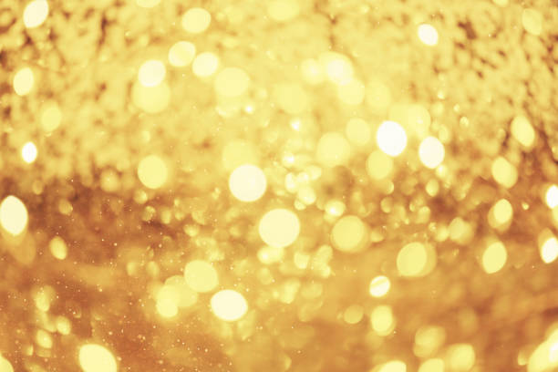 istock Golden festive background with glitter and lights 1291464209