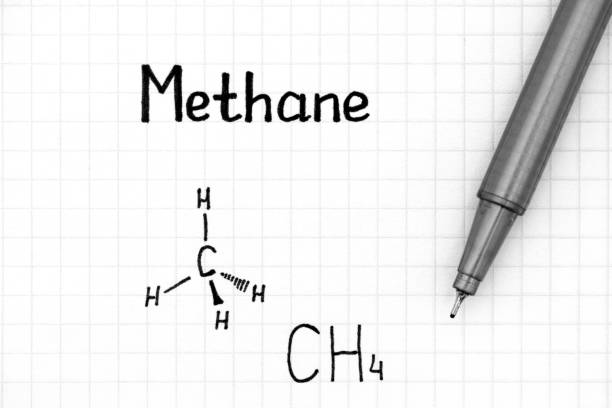 Chemical formula of Methane with pen. Close-up.