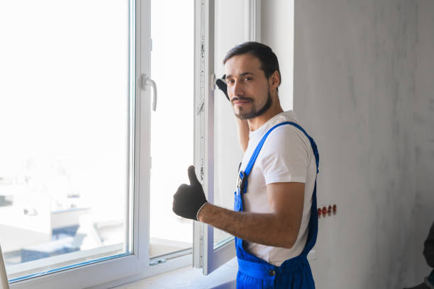 istock Foreman installs the window and looks at the camera 1291467078
