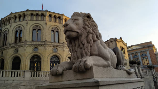 istock Big Lion statue near the Storting building in Oslo, Norway. 1291475649