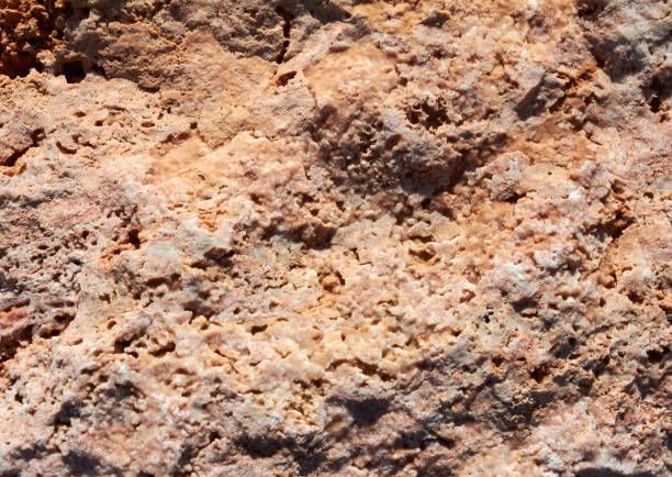 istock Textured stone, sandstone, limestone surface. Close image. Stone, natural abstract texture for backgrounds. Close up. Wallpaper, architecture. 1291479692