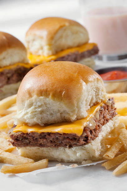 istock The Original Pan Baked Cheese Burger Sliders with Fried Onions on Soft Dinner Rolls 1291485396
