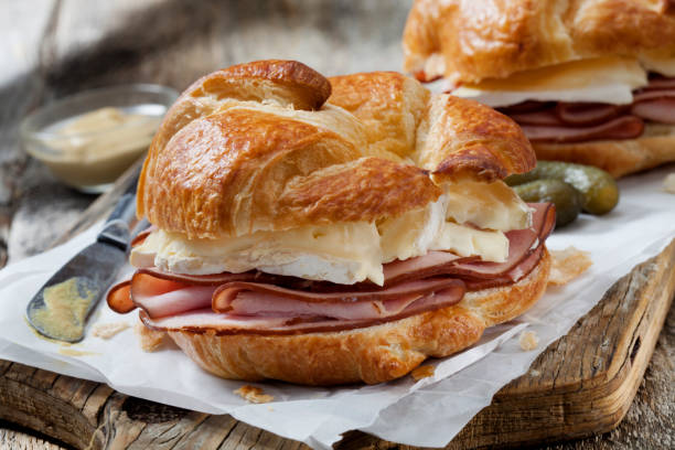 istock Ham and Brie Croissant Sandwiches with Dijon Mustard 1291487080