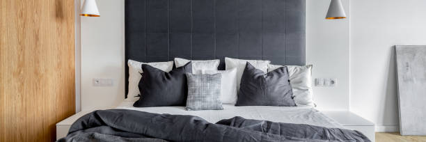 istock Beautiful designed and comfortable bedroom, panorama 1291487159