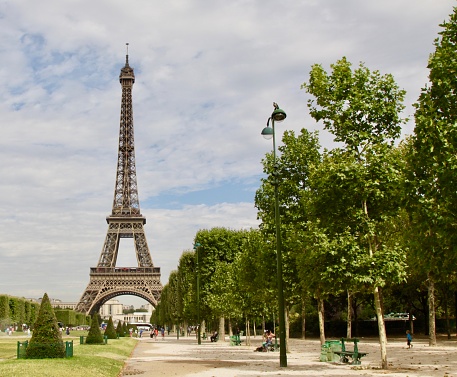The Eiffel Tower in Paris from the grassy Champ de Mars