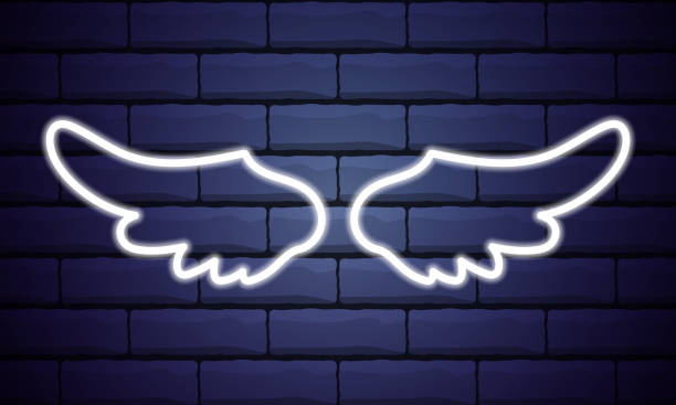istock Angel wings neon sign. Bright light banner. Glowing neon white wings icon on dark brick wall background. Vector illustration. 1291495957