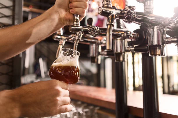 istock Pouring beer for sutomer 1291497334