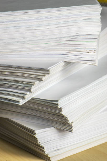 istock pile of paper documents in the office 1291500656