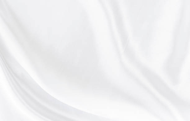 istock White gray satin texture that is white silver fabric silk background with beautiful soft blur pattern natural. 1291502771