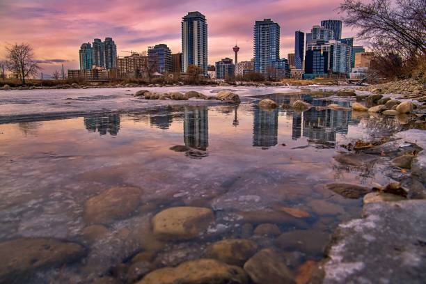 istock Sunrise Skyline Reflections In The Bow River 1291505677
