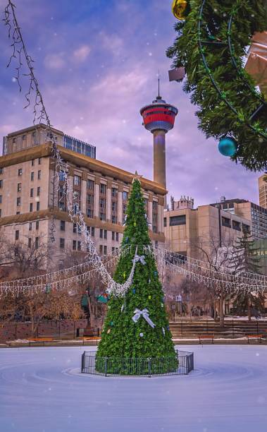 istock Snowfall At A Holiday Olympic Plaza 1291506642