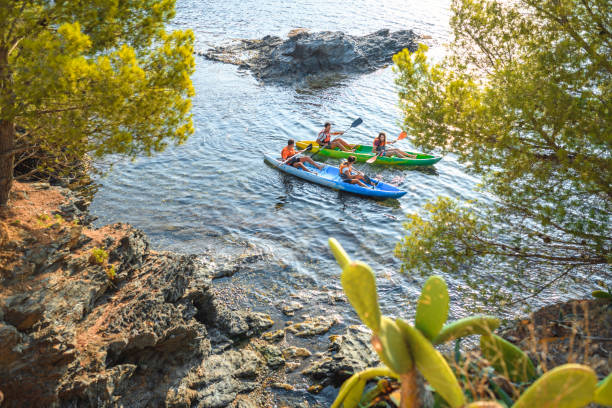 istock Spanish Kayakers Side by Side Along Mediterranean Shoreline 1291507950