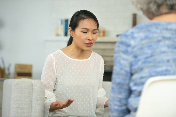 istock Female asian patient frustrated at therapy session 1291508006