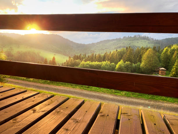 istock Mountains and green hills landscape at sunset time. 1291508150