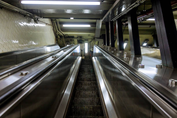 istock Mechanical escalators for people up and down in the subway 1291518198