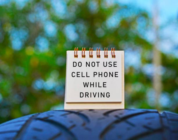 istock Text Written On A Notepad With Blurred Green Background. Road Traffic Concept 1291519485