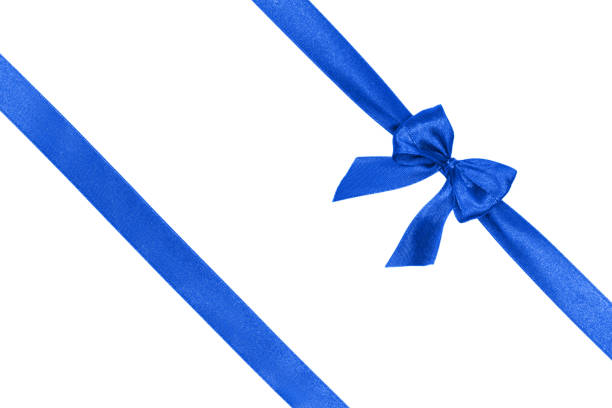 istock Blue satin ribbon with a bow isolated on white background. 1291521045