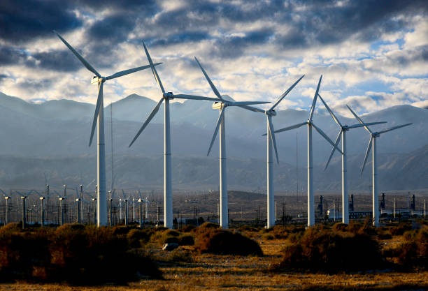 istock Monster Windmill Turbines in Palm Springs on a cloudy day. 1291523440