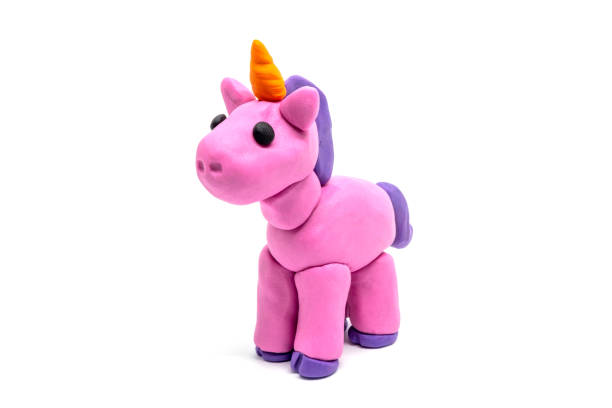 istock Play dough unicorn on white background. Handmade clay plasticine 1291527677
