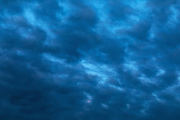 istock Defocused sky texture with dark rain clouds for use as background 1291532705