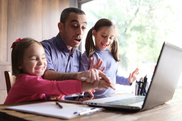 istock Father Trying To Work At Home And Children Distracting Him From Work, Concept For Difficulties Of Remote Working In Pandemic Period 1291532868