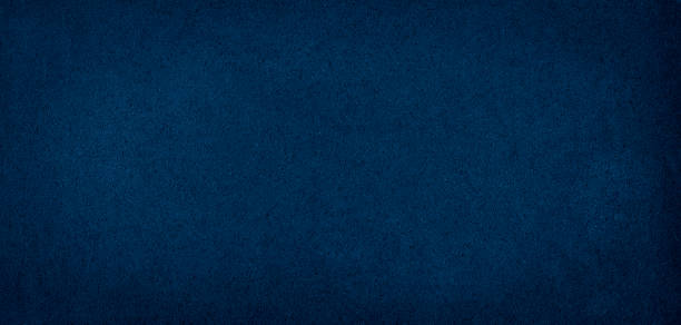 istock Abstract background - foamed rubber, non-uniform dark blue backdrop for design. 1291536336