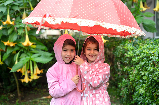 Kids enjoying the rain