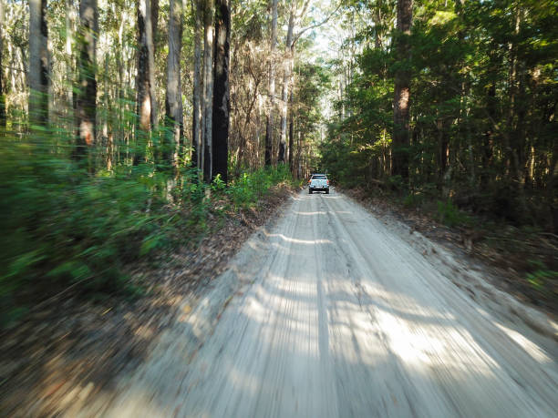 Young man driving off road ATV ar Lençois Maranhenses.