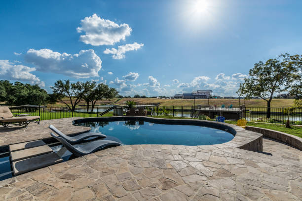 istock Stones everywhere around swimming pool 1291541178