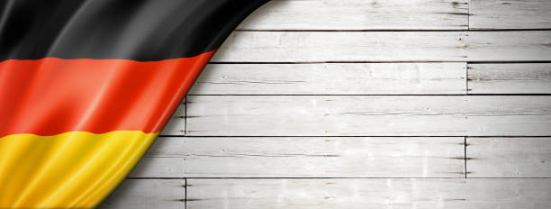 istock German flag on old white wall banner 1291543639