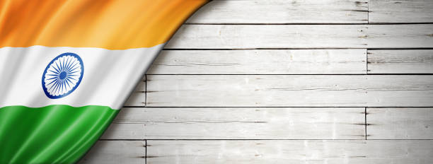 istock Indian flag on old white wall banner 1291543659