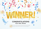 istock Golden winner word on white background with colorful confetti. Winning vector illustration template. Congratulations with absolutely victory. 1291544711