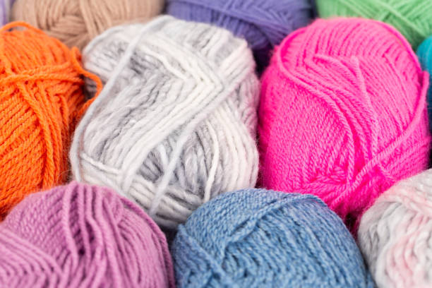 istock The stack of colorful knitting yarn clews 1291546657