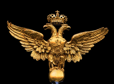 Russian Double Headed Eagle the coat of arms of Russian Empire Emblem isolated in black background