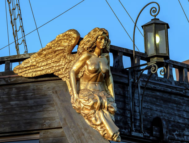 Antique golden statue angel figurehead Antique golden statue angel figurehead decorative rostrum ship figurehead stock pictures, royalty-free photos & images