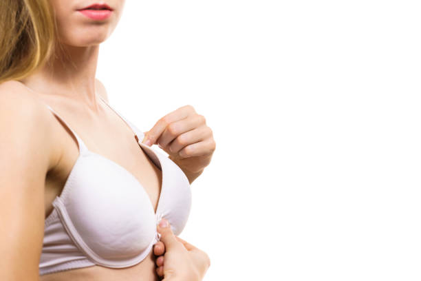 istock Female wearing too big bra 1291547937