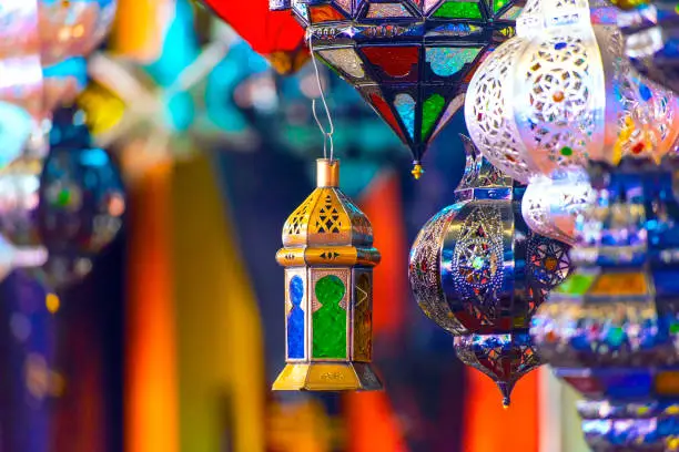 Traditional souvenir Moroccan lamps at the oriental market in Morocco