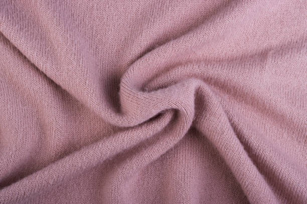 istock Crumpled twisted wool fabric close-up for background 1291551773