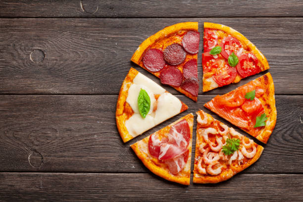 istock Tasty slices of different pizza 1291554274
