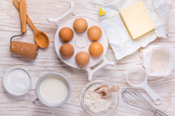 istock Assorted baking ingredients and kitchen utensils for cooking and baking 1291556297