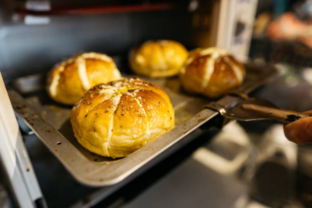 istock Baked bread in the oven 1291562218