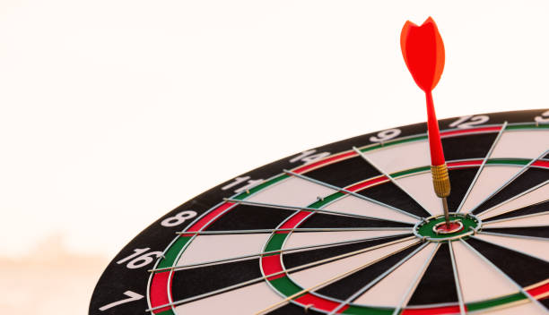 istock dart arrow hit center on Bullseye 1291564167