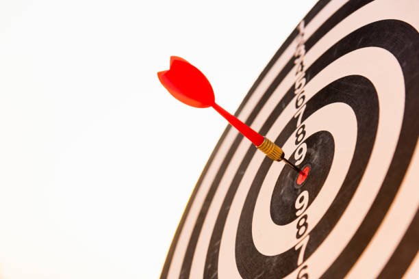istock dart arrow hit center on Bullseye 1291564168