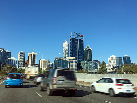 Perth - Dec 14 2020:Rush hour traffic in Perth Western Australia.There are about 18,000,000 cars in Australia.That's equivalent to 92.5% of households that have a car, or almost 2 cars per household.