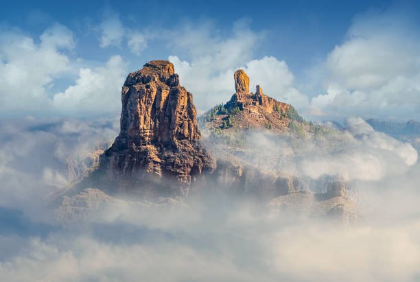 Landscape with Roque Bentayga and Roque Nublo Landscape with Roque Bentayga and Roque Nublo in the background, Gran Canaria, Canary Islands, Spain alpine climate photos stock pictures, royalty-free photos & images