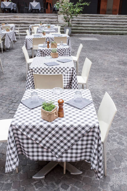 istock typical Italian restaurant with tables set outdoors 1291565357