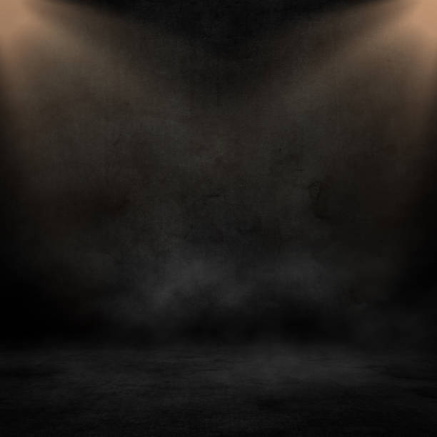 istock 3D grunge interior with spotlight shining down 1291569574