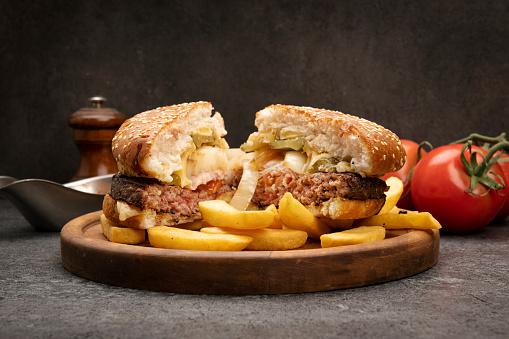 Delicious cheeseburger cut in half