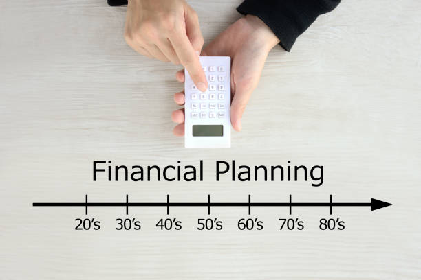 istock Human's hands calculating money for financial planning 1291572759