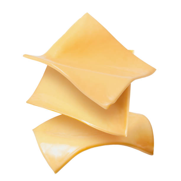 trois tranches jaunes de fromage d’isolement sur le fond blanc - yellow cheese thin portion photos et images de collection